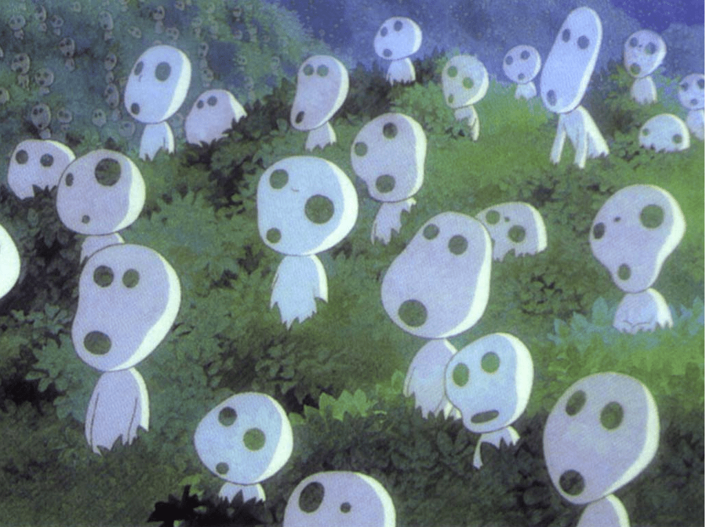 A group of white, ghost-like figures with round faces and distinct facial features standing in a green, grassy area under a twilight sky.
